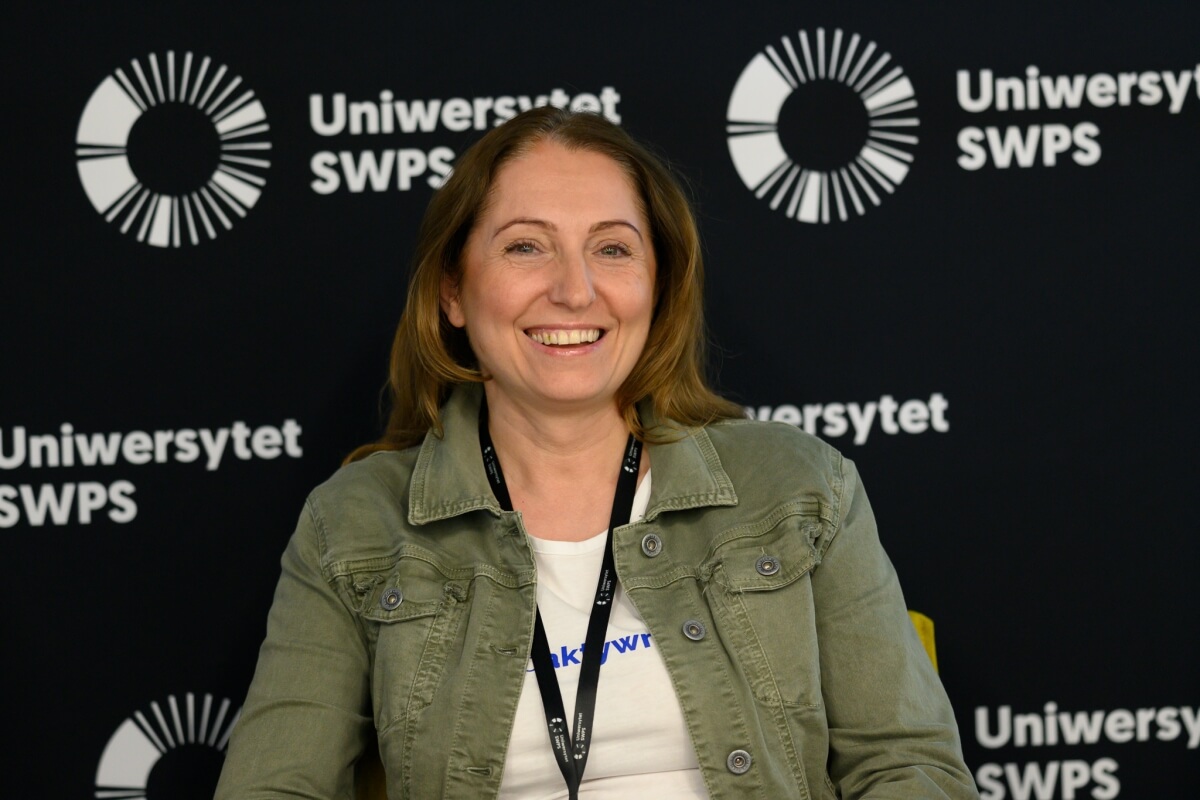Katarzyna Klimek, uczestniczka debaty dotyczącej jakości życia, która odbywa się na Uniwersytecie SWPS