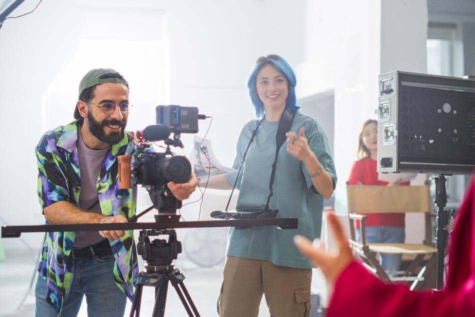 Man and woman filmmakers on a film set