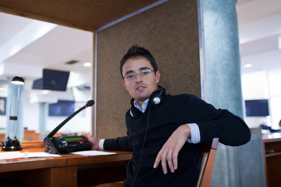 Interpreter in a translation booth